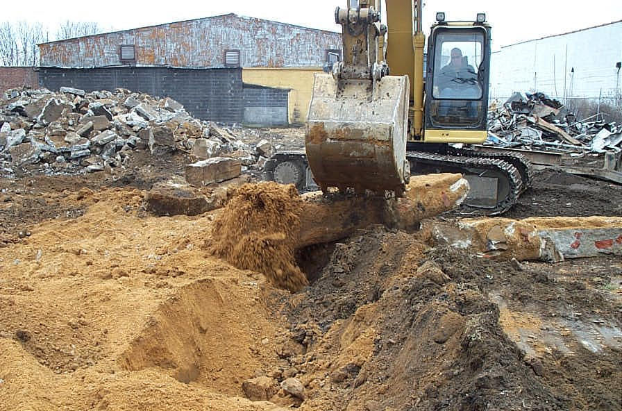 Town of Hempstead, NY. Removal of foundation remains as part of a 25-site demolition project to convert blighted facilities into new, low-cost housing.